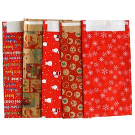 Sacchetto carta c/patella adesiva 20x35+5cm fantasie natale assortite Sadoch